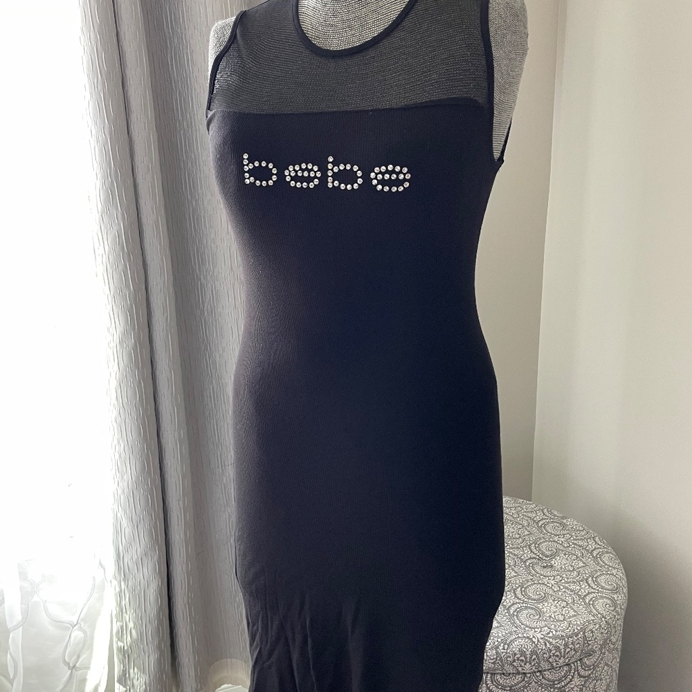 Black Bebe stretch dress. Sheer neckline. Sz M